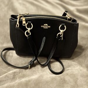 Beautiful black Coach small purse in excellent condition!